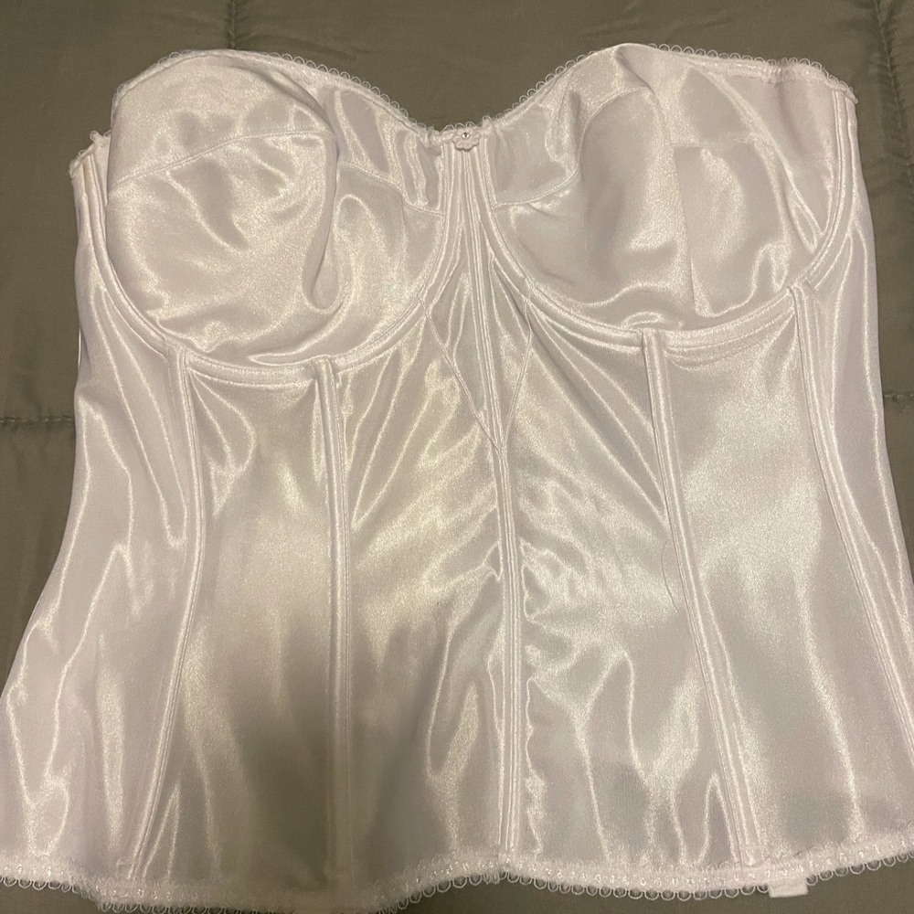 44D corset bra. Worn once .  All hooks and eyes are intact